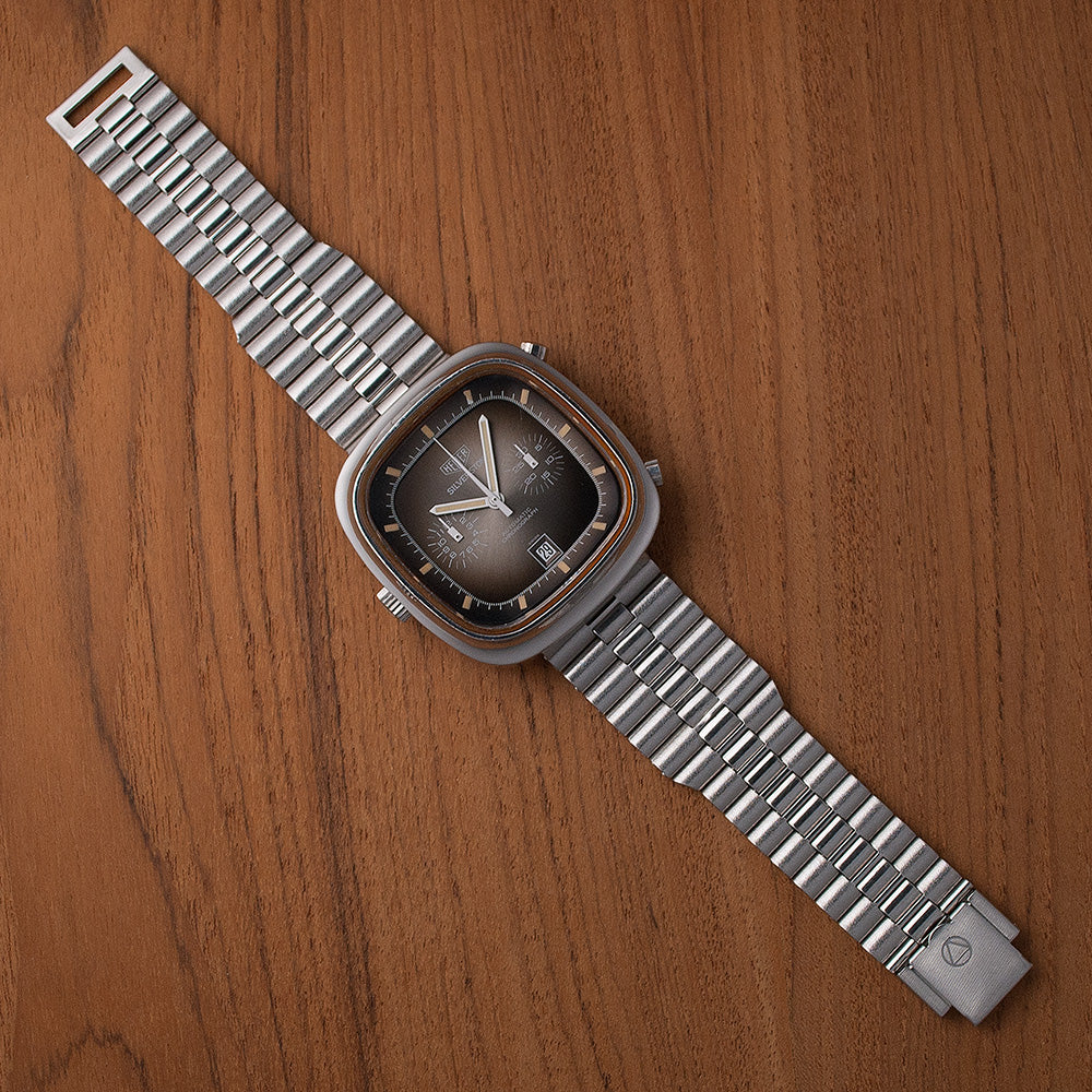 Heuer Silverstone «Fumé», Referenz 110313 F, Automat, ca. 1975, NSA-Stahlarmband