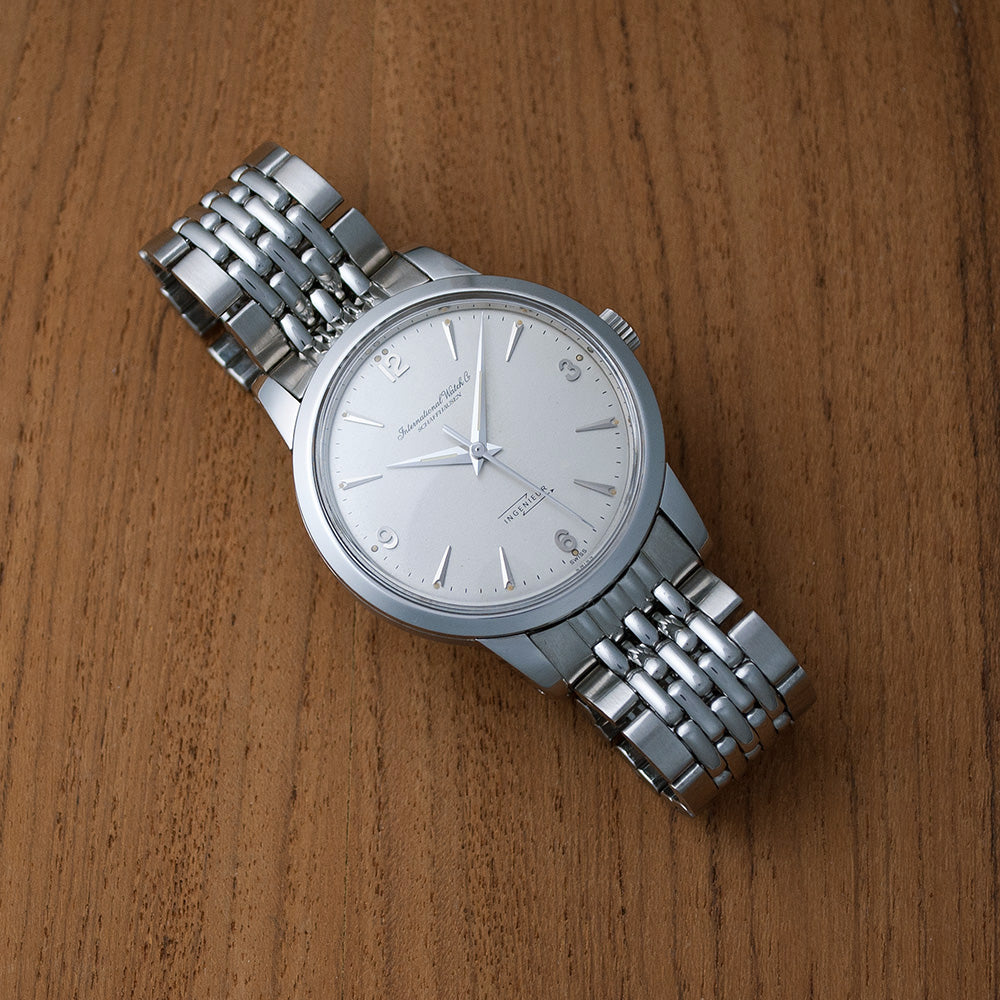 IWC Ingenieur, Ref. 666 A, versilbertes Zifferblatt, 1956, Automat, Original IWC «Guy Frères» Stahlarmband, revidiert, Garantie bis 02/24